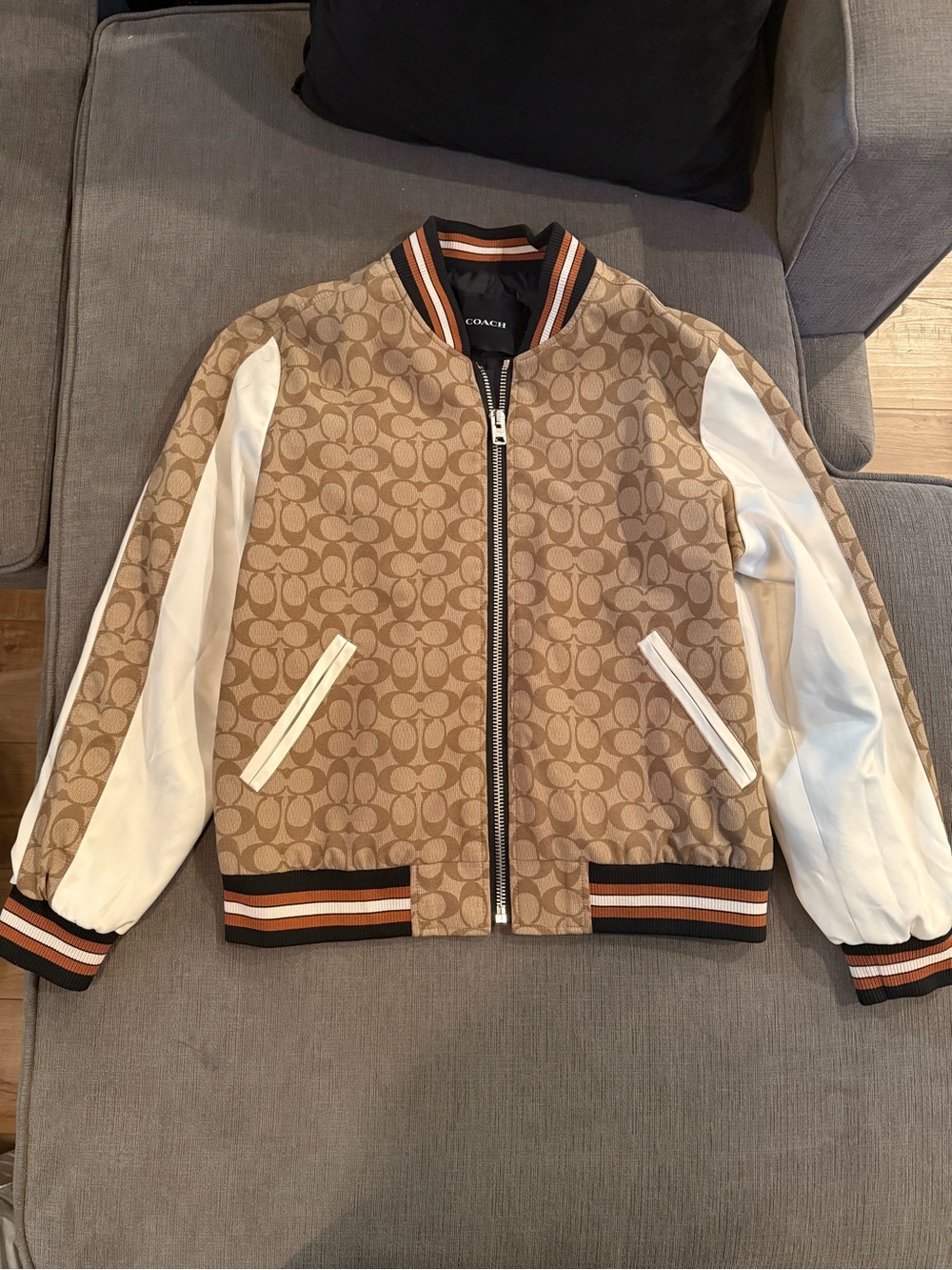 Coach Tan Signature Monogram Bomber Jacket with White Sleeves